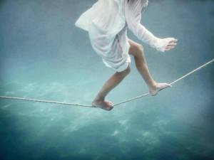 girl on rope underwater