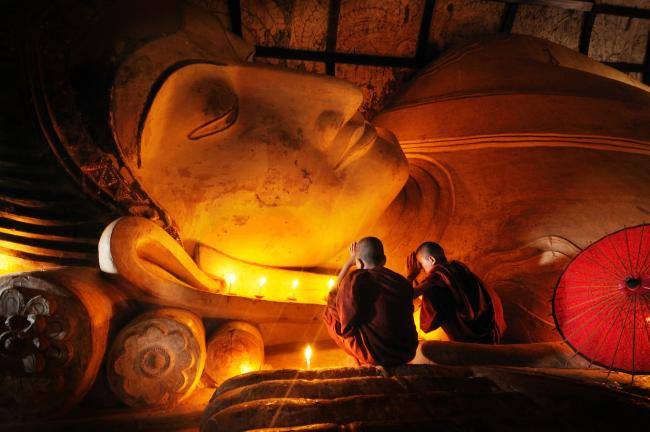 monks with lying down Buddha